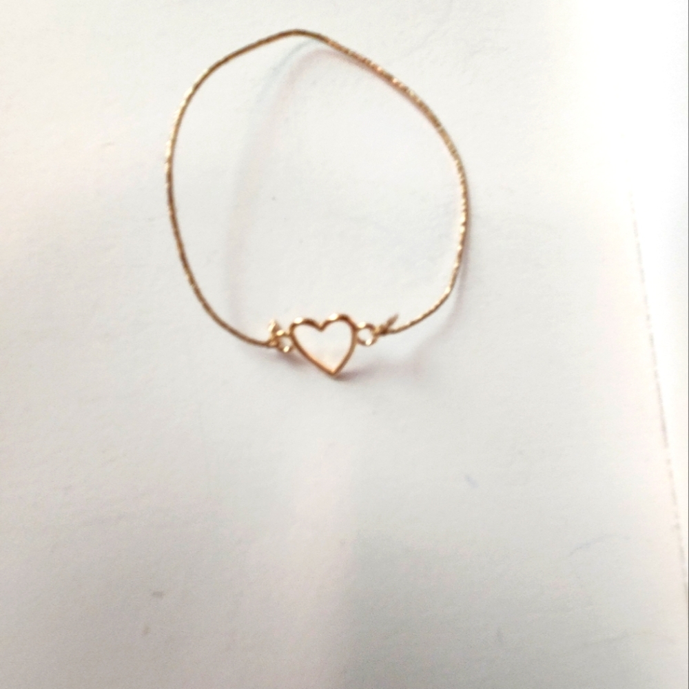 Handcrafted goldtone cord bracelet